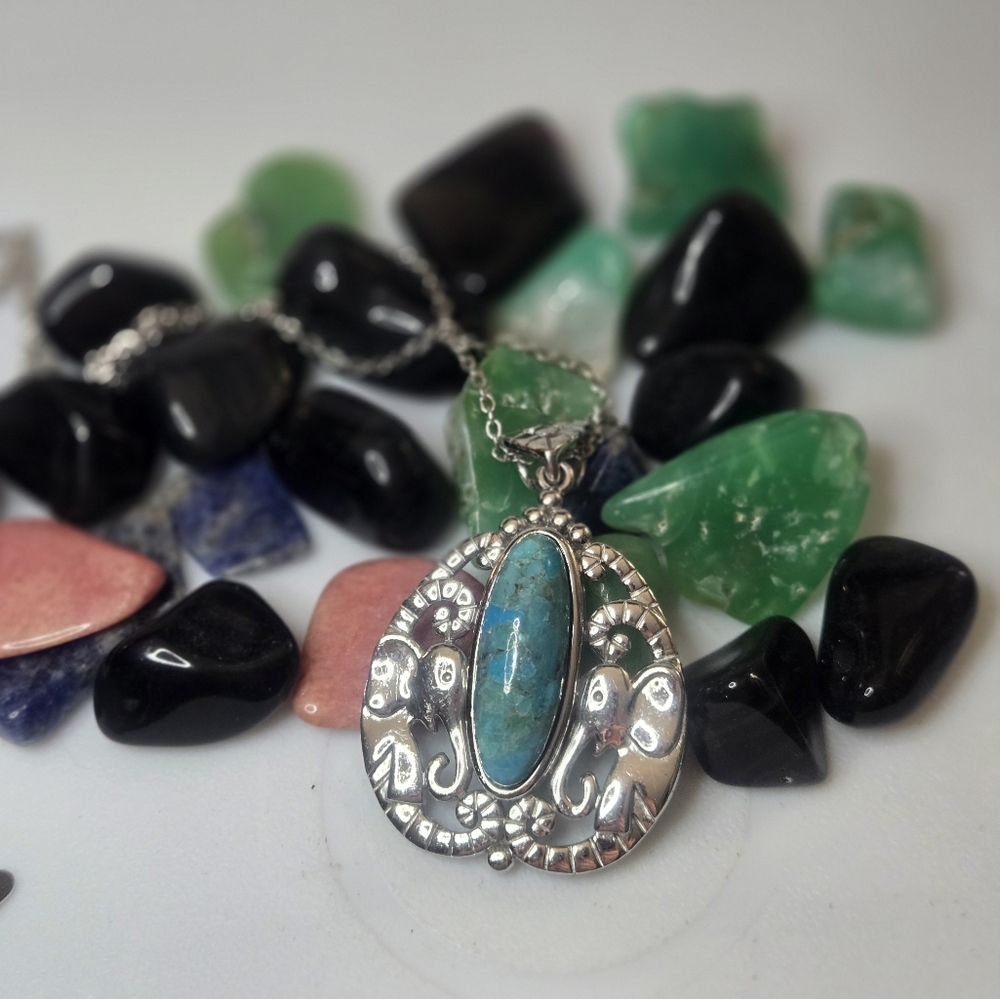 Intricate Silver and Green Gemstone Pendant Necklace